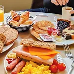 호텔 De France, Un Ammi